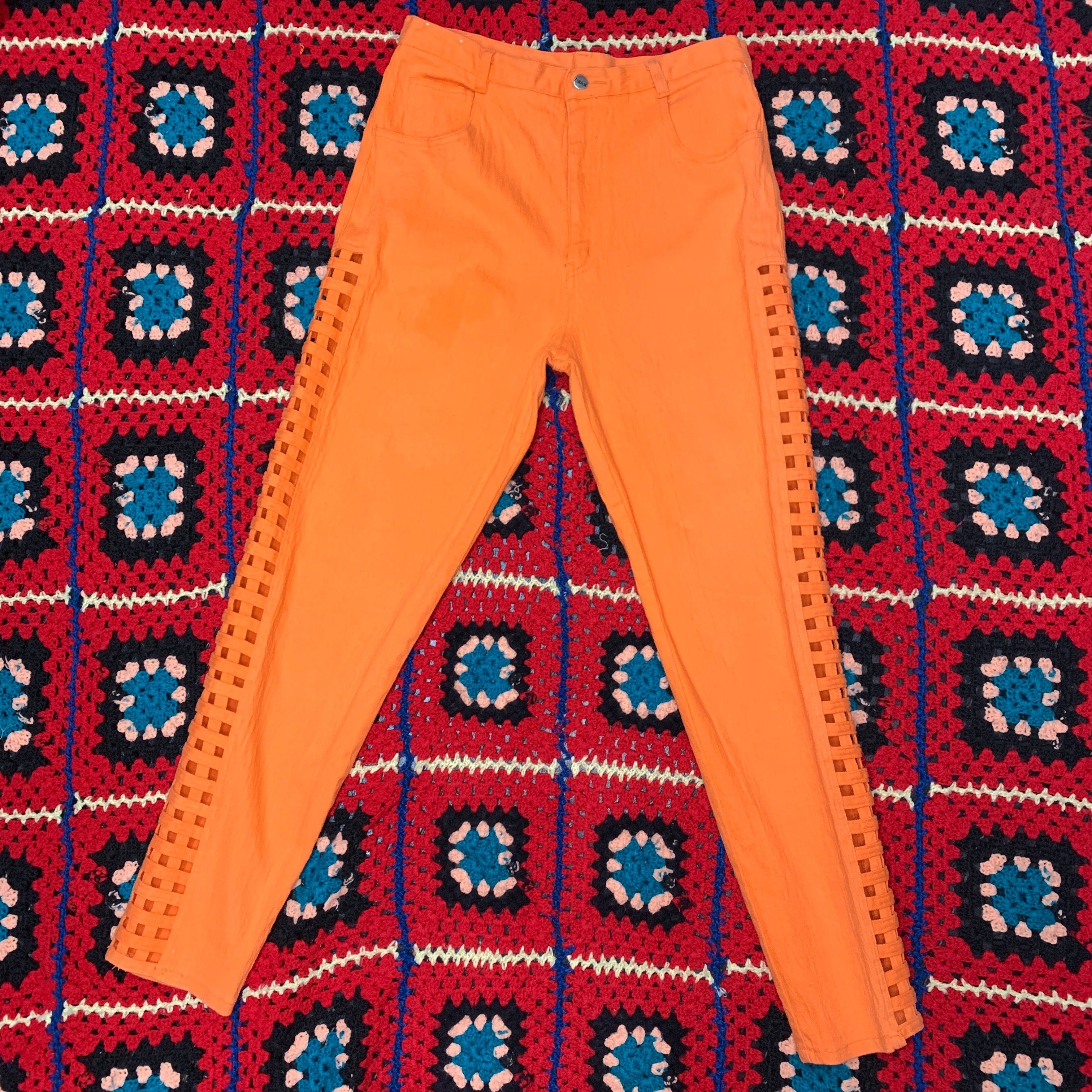 Pantalon vintage orange taille haute, coupé sur les cotés