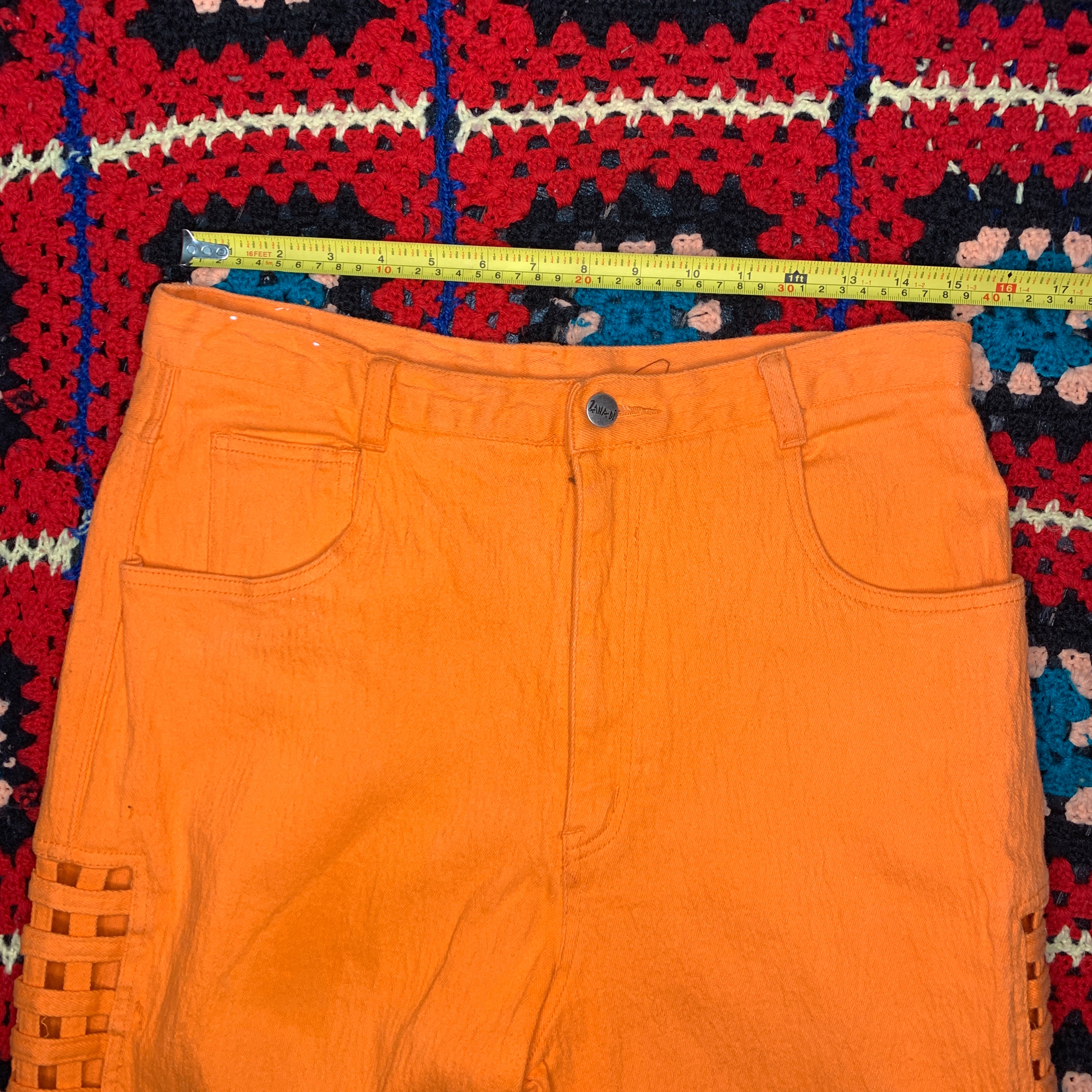Pantalon vintage orange taille haute, coupé sur les cotés